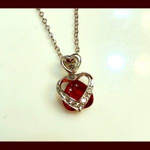 Heart necklace with small diamond accents